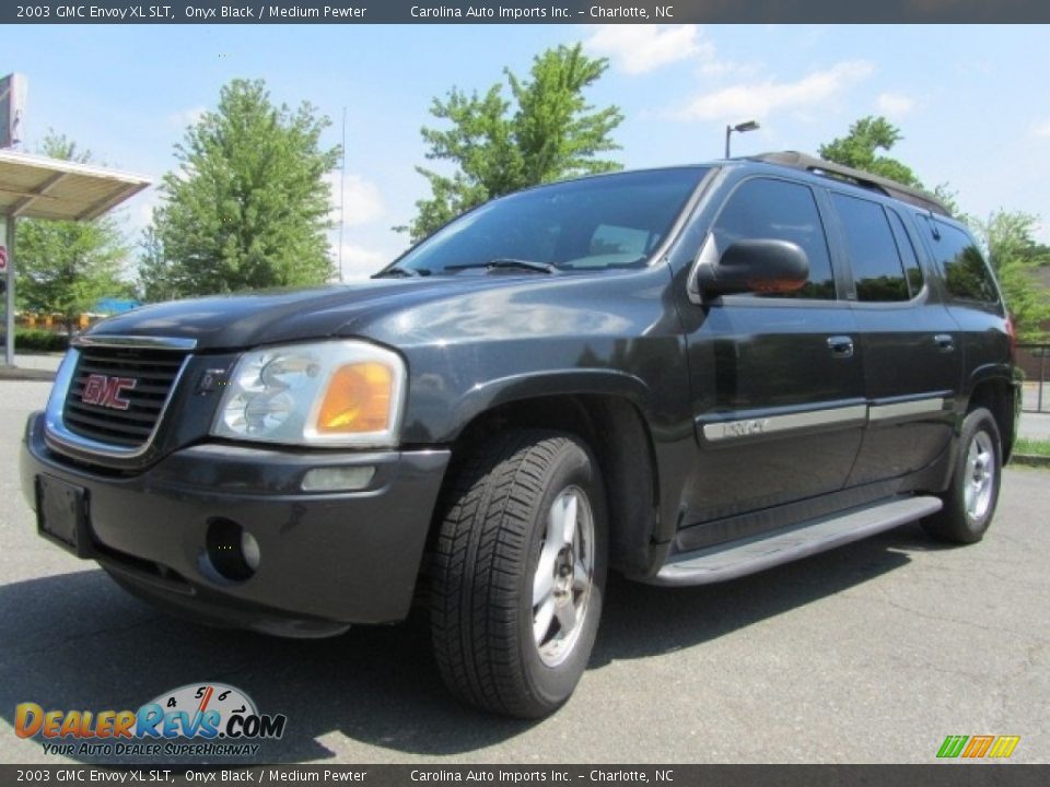 Front 3/4 View of 2003 GMC Envoy XL SLT Photo #6