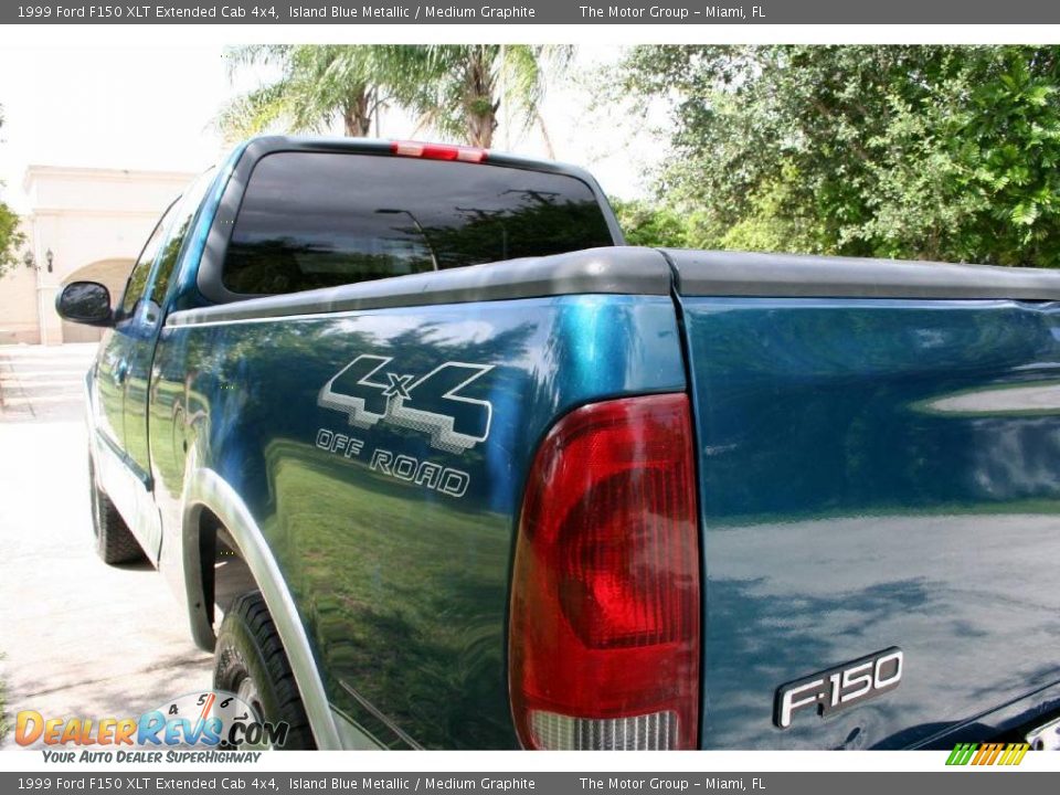 1999 Ford F150 XLT Extended Cab 4x4 Island Blue Metallic / Medium Graphite Photo #27