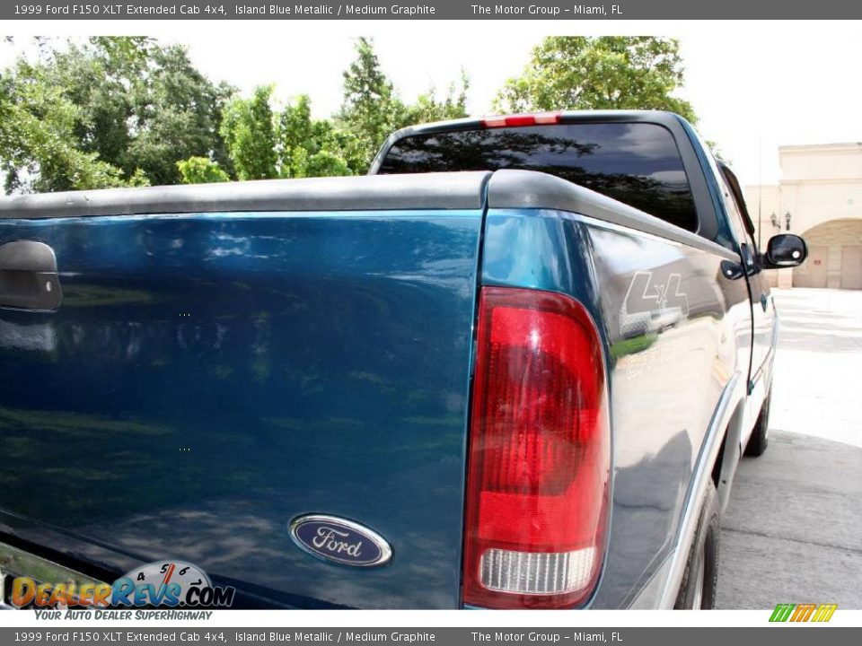 1999 Ford F150 XLT Extended Cab 4x4 Island Blue Metallic / Medium Graphite Photo #28