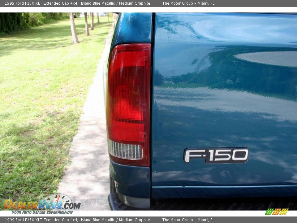 1999 Ford F150 XLT Extended Cab 4x4 Island Blue Metallic / Medium Graphite Photo #32