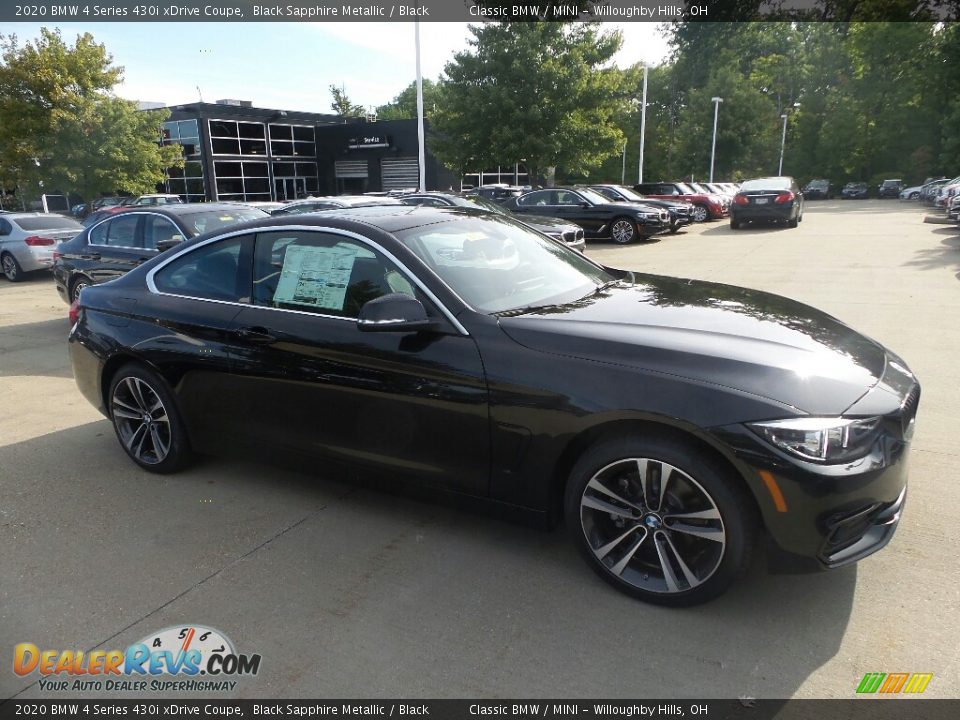 Front 3/4 View of 2020 BMW 4 Series 430i xDrive Coupe Photo #1