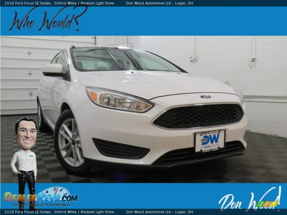 2018 Ford Focus SE Sedan Oxford White / Medium Light Stone Photo #1