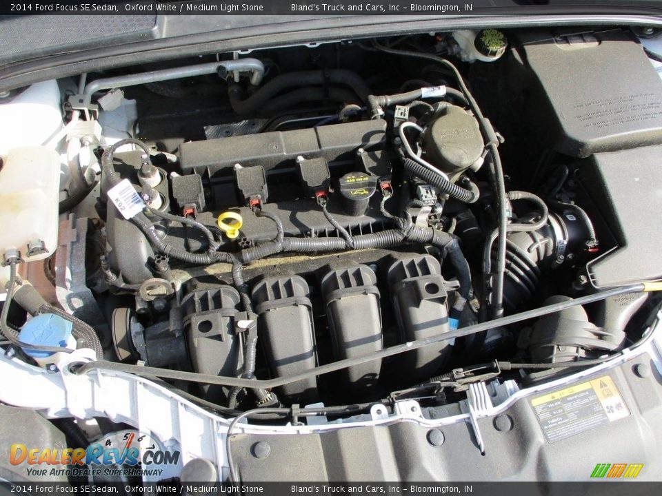 2014 Ford Focus SE Sedan Oxford White / Medium Light Stone Photo #29