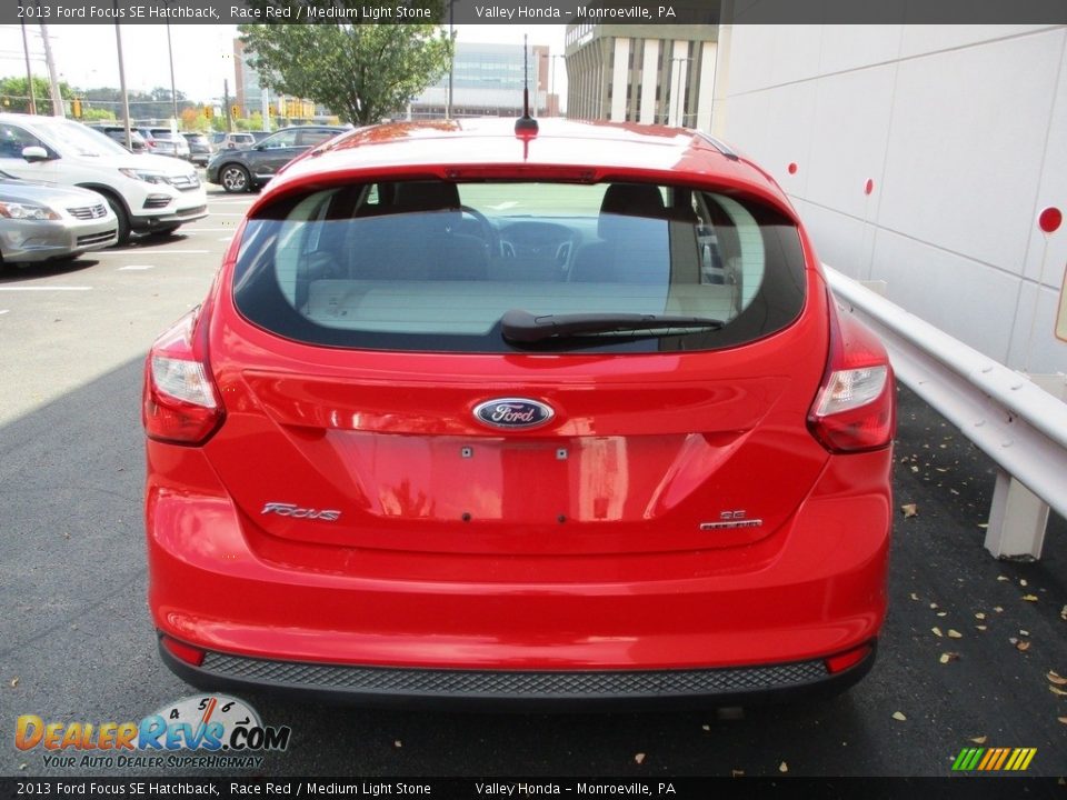 2013 Ford Focus SE Hatchback Race Red / Medium Light Stone Photo #4