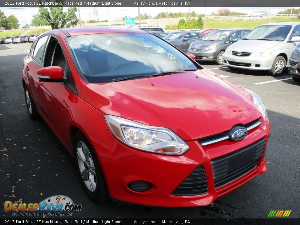 2013 Ford Focus SE Hatchback Race Red / Medium Light Stone Photo #7