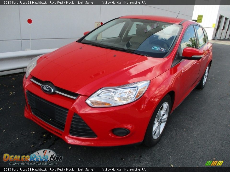2013 Ford Focus SE Hatchback Race Red / Medium Light Stone Photo #9
