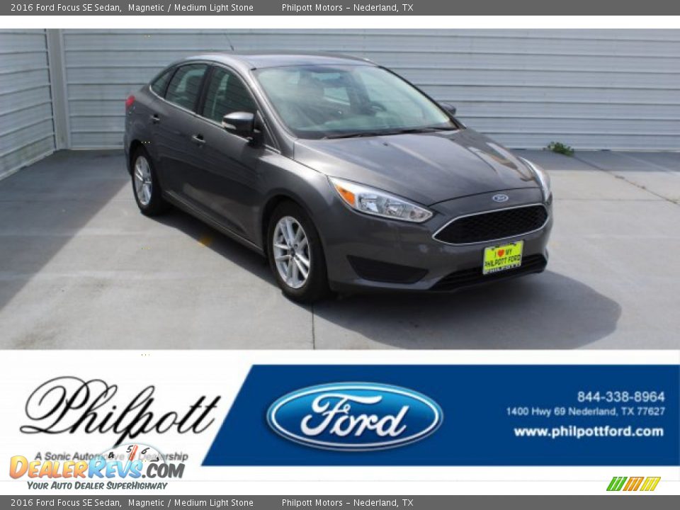 2016 Ford Focus SE Sedan Magnetic / Medium Light Stone Photo #1
