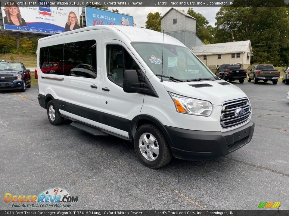 Front 3/4 View of 2019 Ford Transit Passenger Wagon XLT 350 MR Long Photo #4