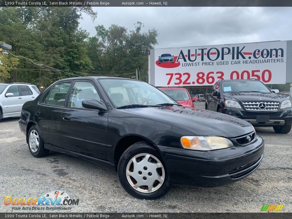 1999 Toyota Corolla LE Satin Black Metallic / Pebble Beige Photo #1