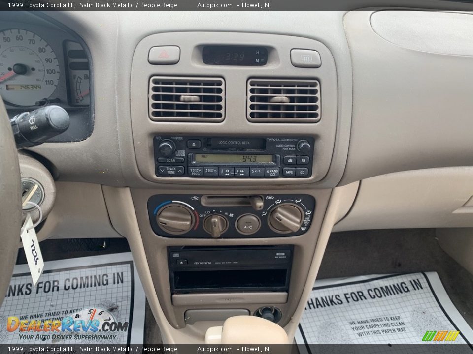 1999 Toyota Corolla LE Satin Black Metallic / Pebble Beige Photo #17