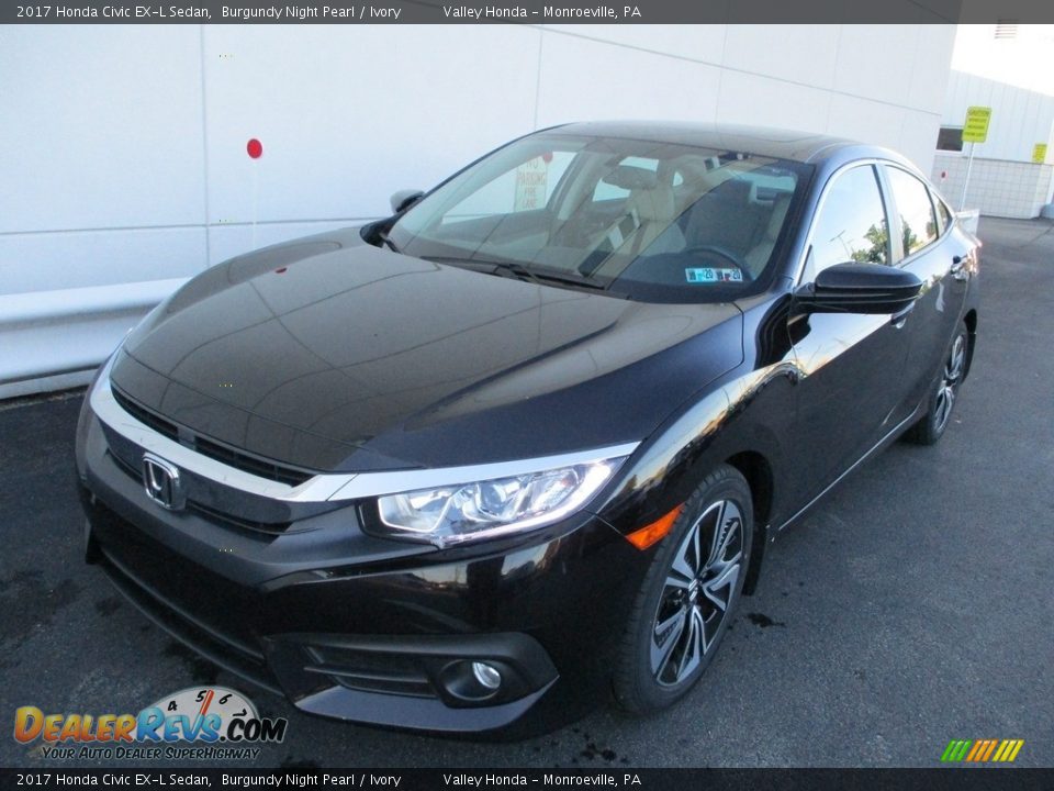 Front 3/4 View of 2017 Honda Civic EX-L Sedan Photo #8