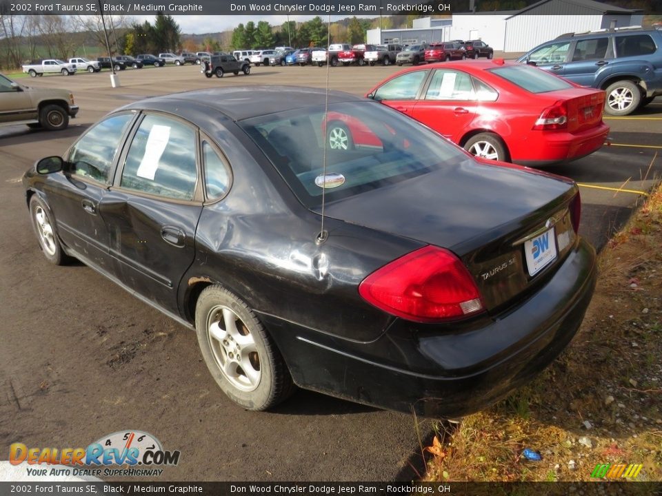 2002 Ford Taurus SE Black / Medium Graphite Photo #7