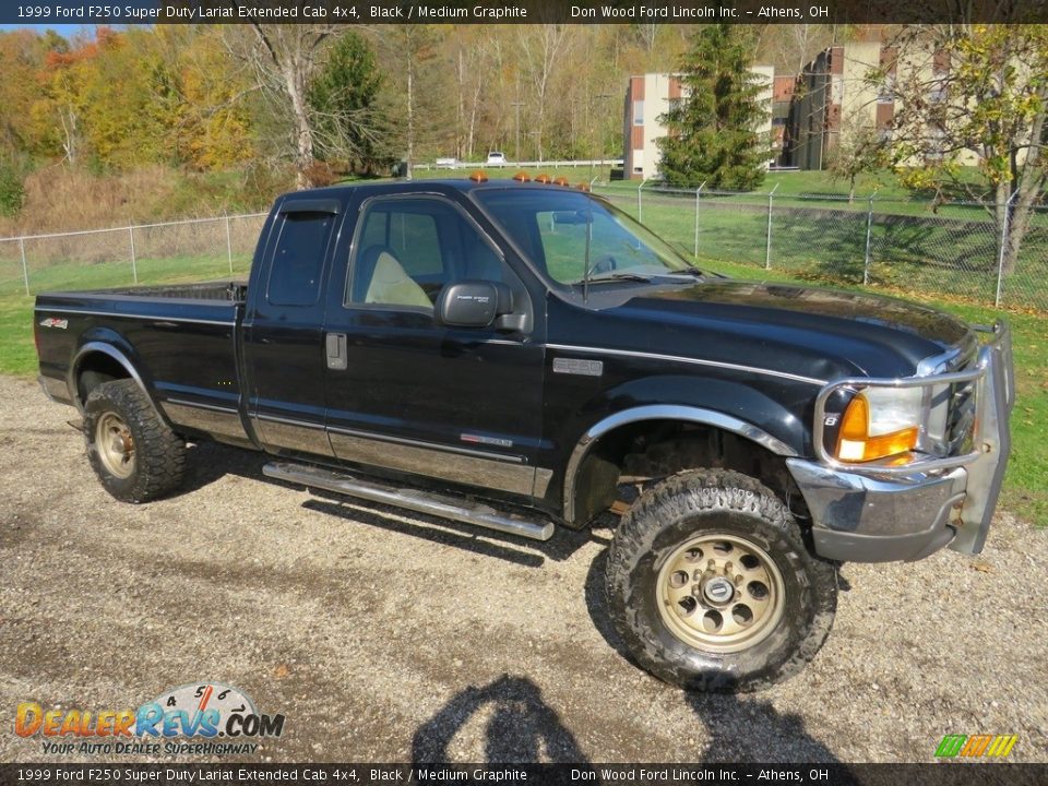 Front 3/4 View of 1999 Ford F250 Super Duty Lariat Extended Cab 4x4 Photo #2