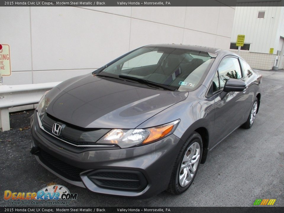 Front 3/4 View of 2015 Honda Civic LX Coupe Photo #9