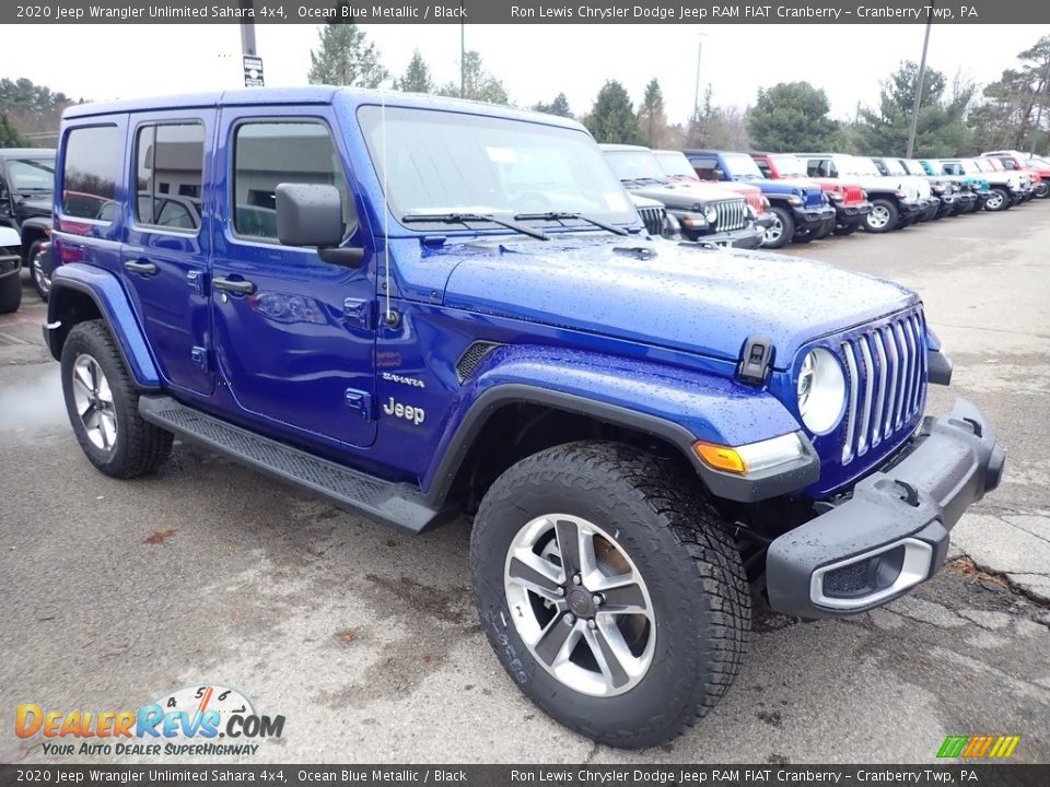 Front 3/4 View of 2020 Jeep Wrangler Unlimited Sahara 4x4 Photo #7
