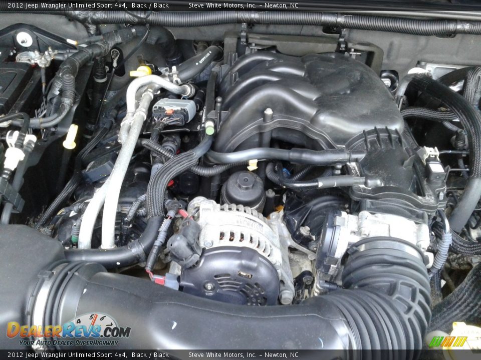 2012 Jeep Wrangler Unlimited Sport 4x4 Black / Black Photo #10