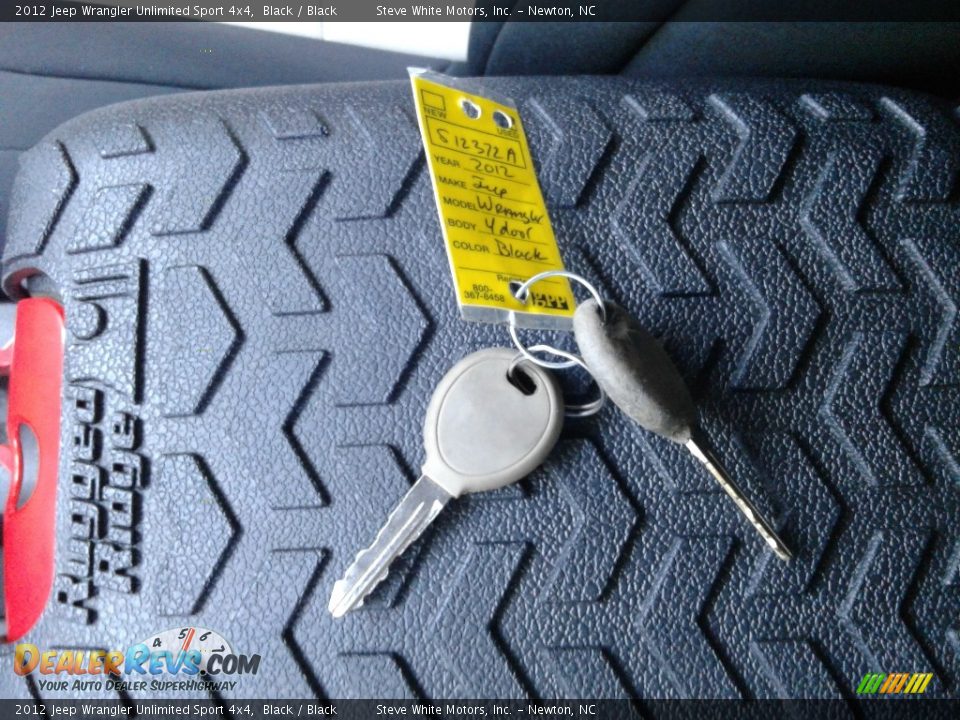 2012 Jeep Wrangler Unlimited Sport 4x4 Black / Black Photo #27