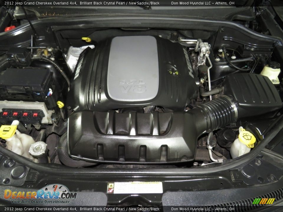 2012 Jeep Grand Cherokee Overland 4x4 Brilliant Black Crystal Pearl / New Saddle/Black Photo #6