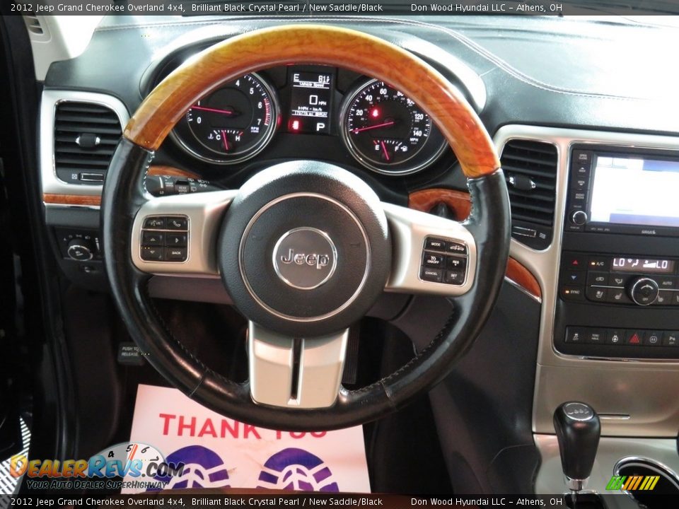 2012 Jeep Grand Cherokee Overland 4x4 Brilliant Black Crystal Pearl / New Saddle/Black Photo #31