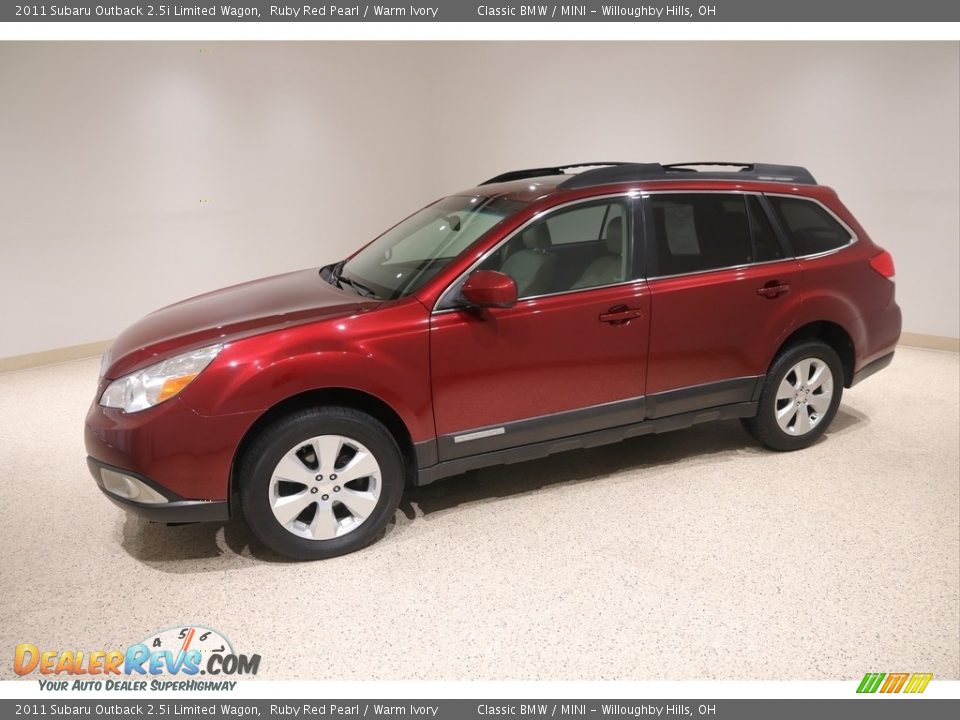 Front 3/4 View of 2011 Subaru Outback 2.5i Limited Wagon Photo #3