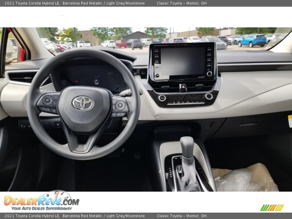 Dashboard of 2021 Toyota Corolla Hybrid LE Photo #4