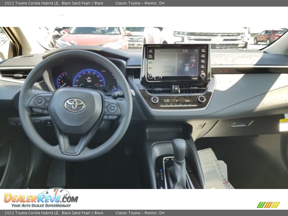 Dashboard of 2021 Toyota Corolla Hybrid LE Photo #3