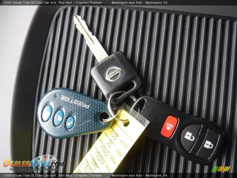 2006 Nissan Titan SE Crew Cab 4x4 Red Alert / Graphite/Titanium Photo #30