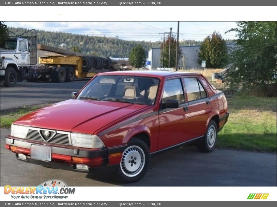 Front 3/4 View of 1987 Alfa Romeo Milano Gold Photo #1