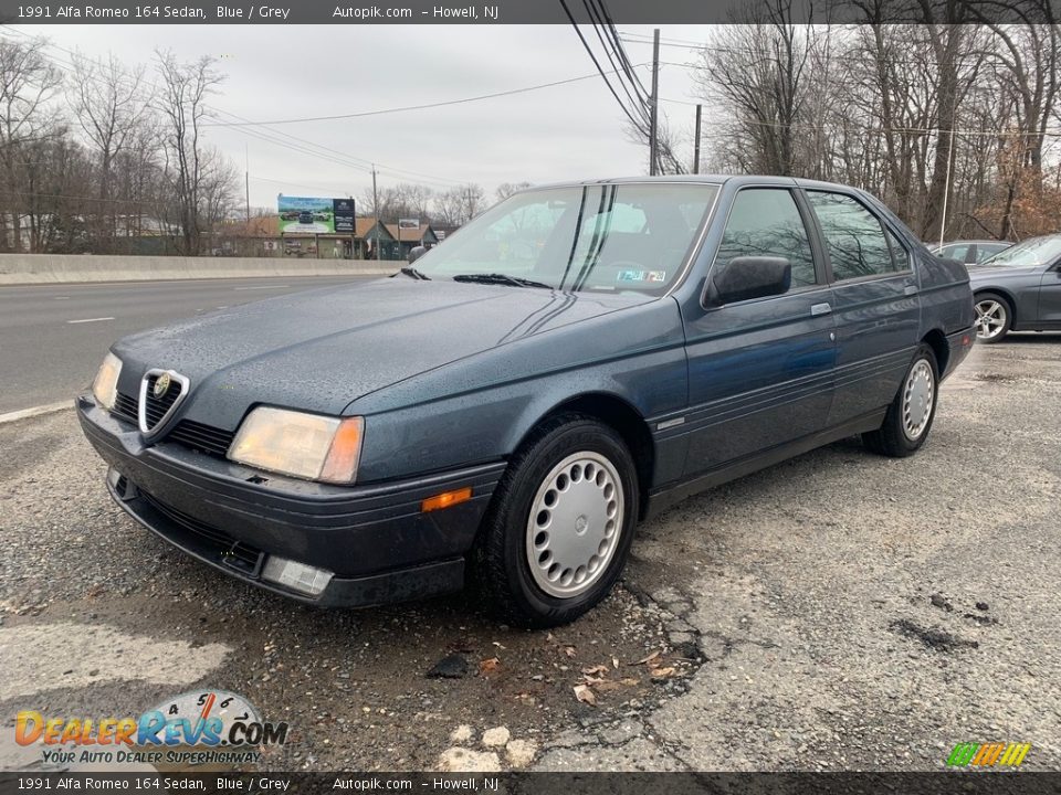 Front 3/4 View of 1991 Alfa Romeo 164 Sedan Photo #7