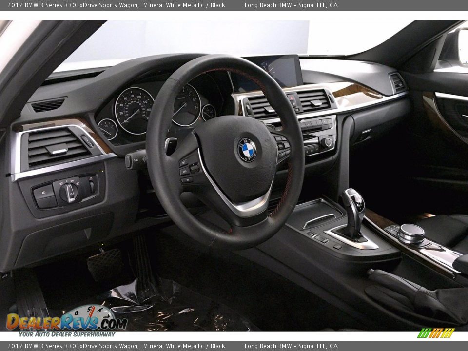 Dashboard of 2017 BMW 3 Series 330i xDrive Sports Wagon Photo #21