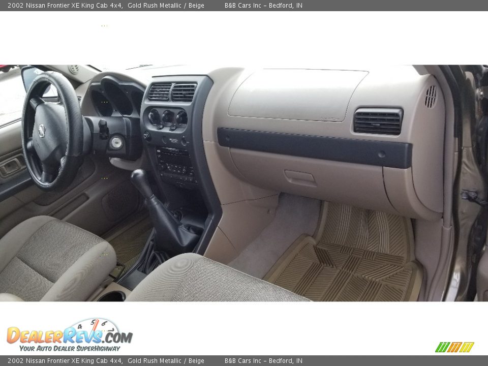 Dashboard of 2002 Nissan Frontier XE King Cab 4x4 Photo #20