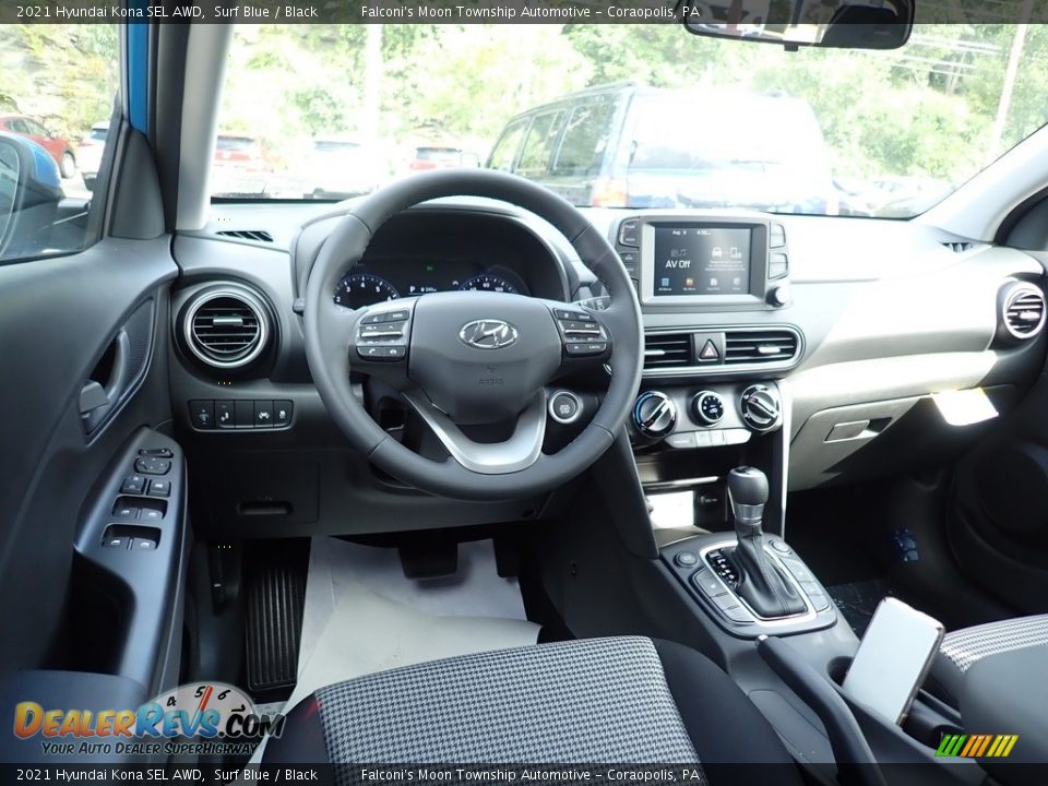 Front Seat of 2021 Hyundai Kona SEL AWD Photo #9
