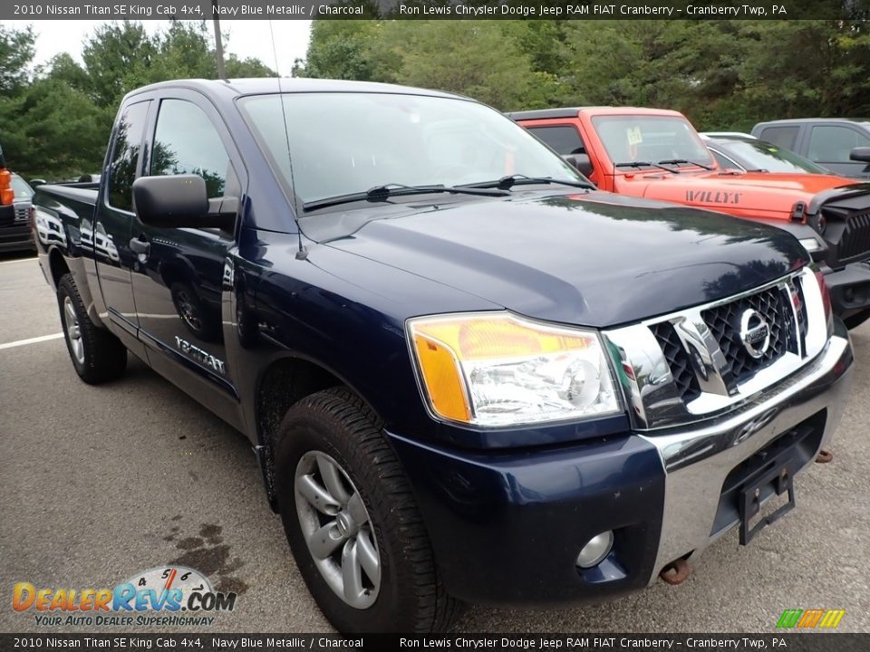 Front 3/4 View of 2010 Nissan Titan SE King Cab 4x4 Photo #2