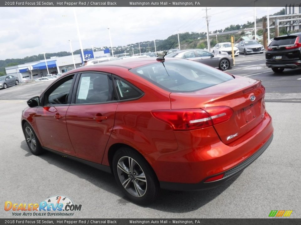 2018 Ford Focus SE Sedan Hot Pepper Red / Charcoal Black Photo #7