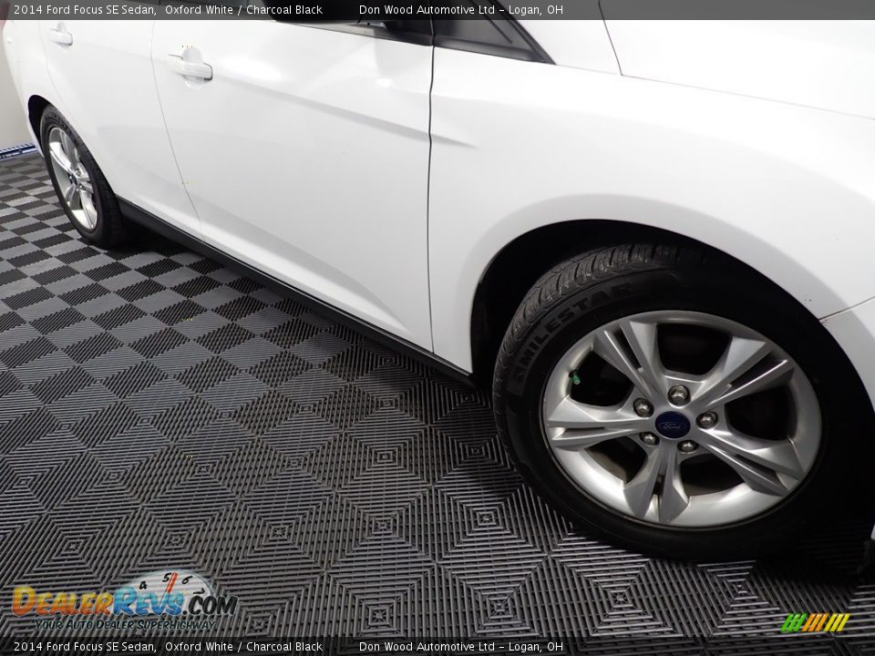 2014 Ford Focus SE Sedan Oxford White / Charcoal Black Photo #4