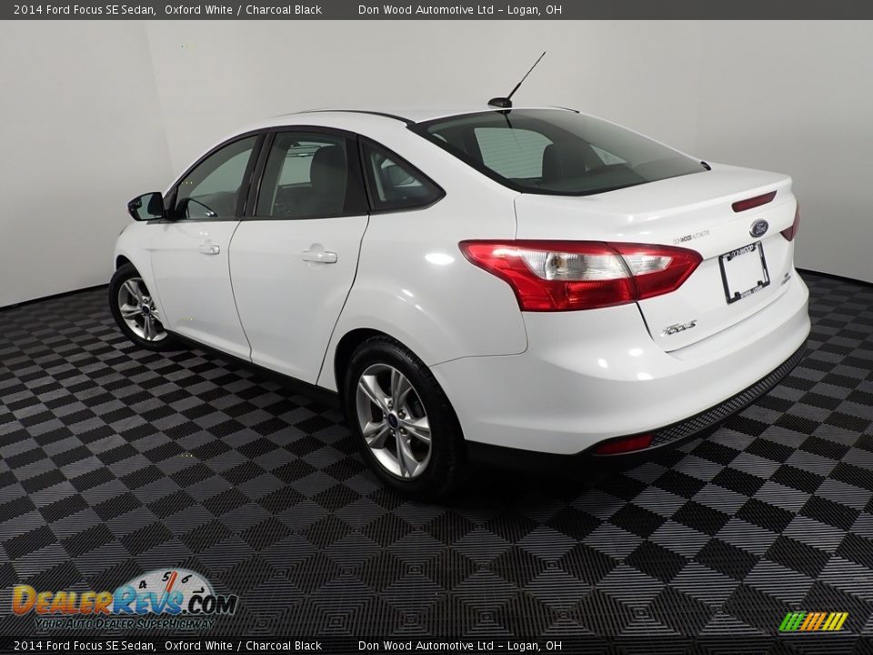 2014 Ford Focus SE Sedan Oxford White / Charcoal Black Photo #11