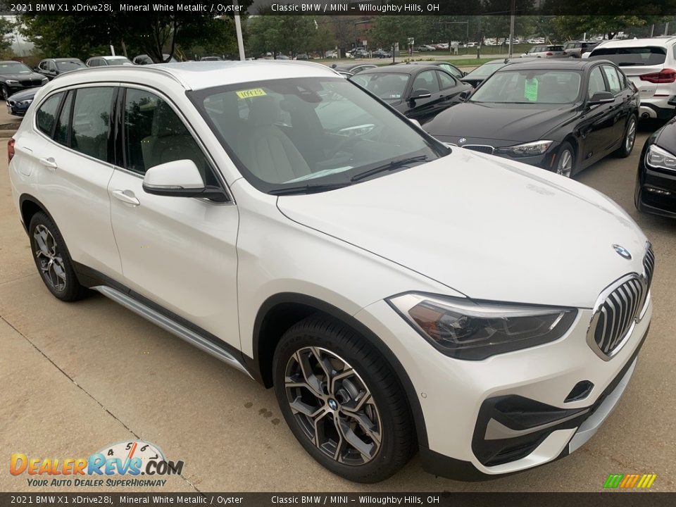 Front 3/4 View of 2021 BMW X1 xDrive28i Photo #1