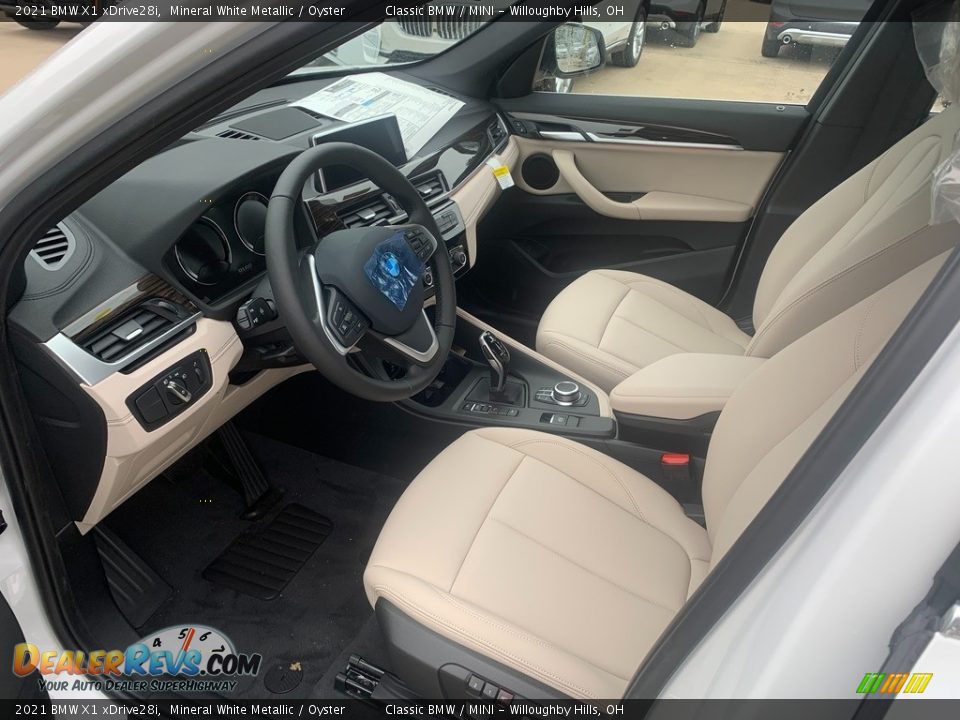 Oyster Interior - 2021 BMW X1 xDrive28i Photo #3