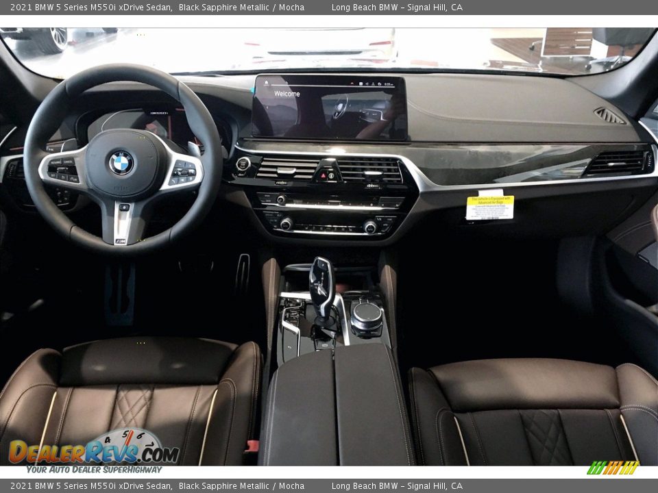 Dashboard of 2021 BMW 5 Series M550i xDrive Sedan Photo #5