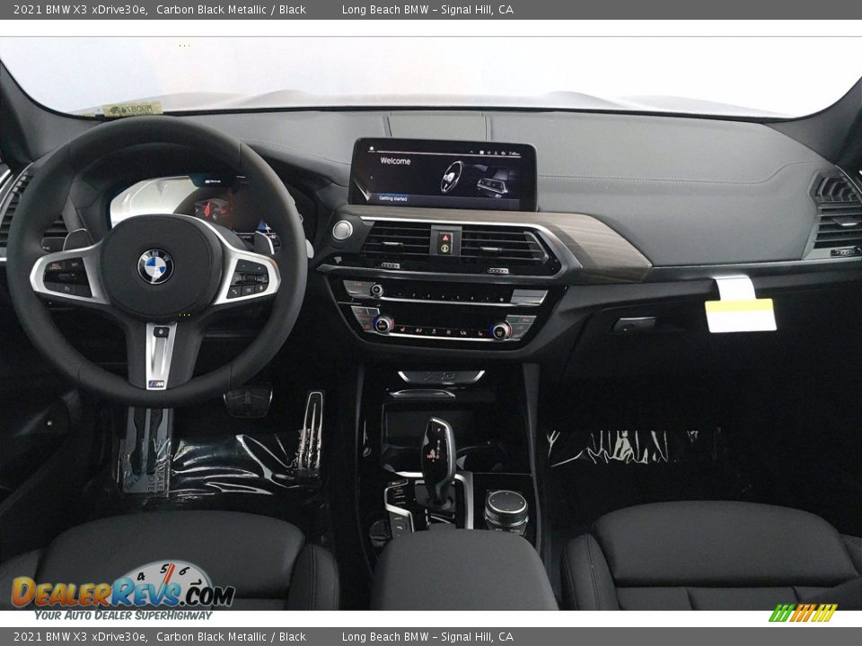 Dashboard of 2021 BMW X3 xDrive30e Photo #5