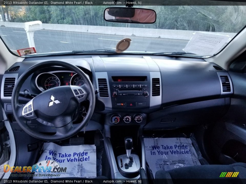 Dashboard of 2013 Mitsubishi Outlander ES Photo #9