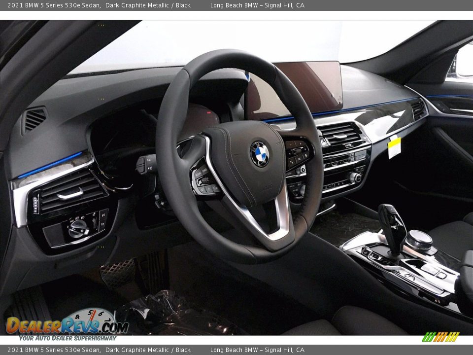 Controls of 2021 BMW 5 Series 530e Sedan Photo #7