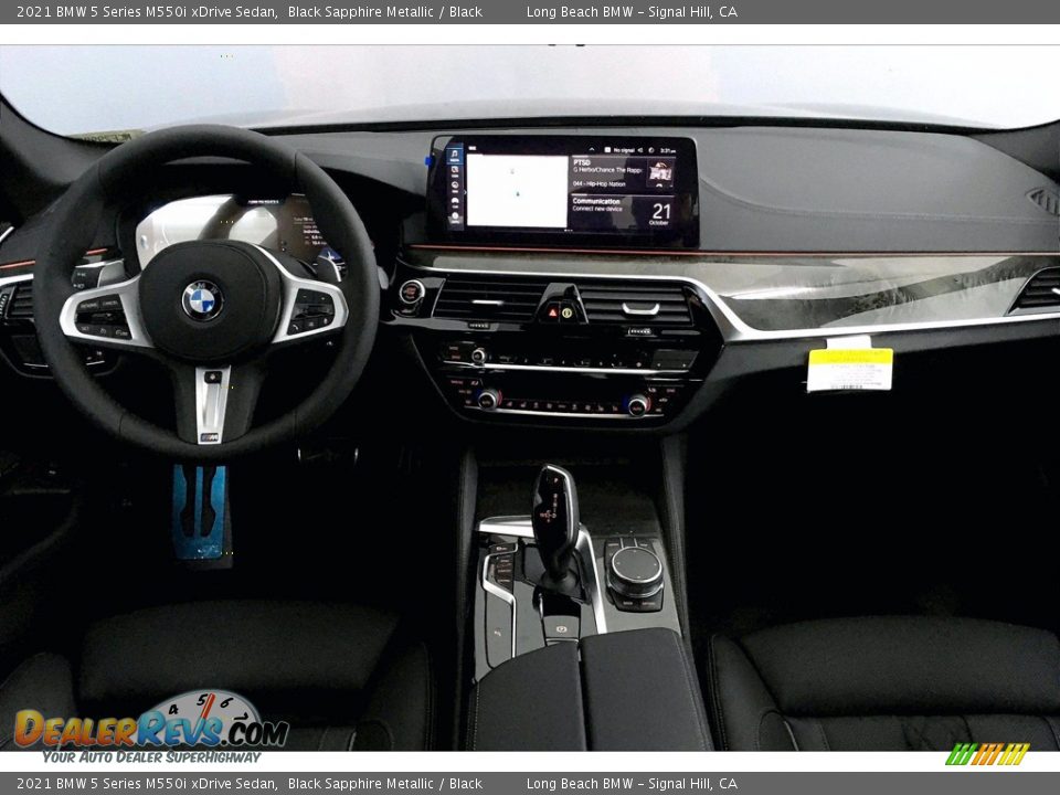 Dashboard of 2021 BMW 5 Series M550i xDrive Sedan Photo #5