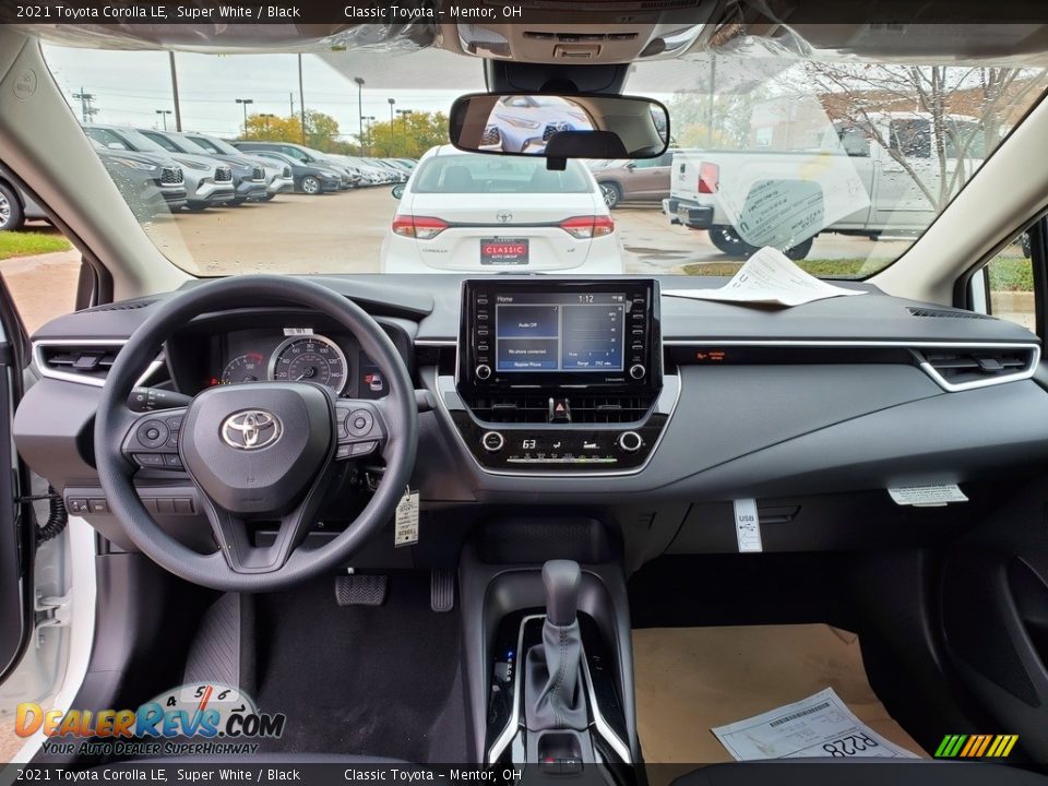 Dashboard of 2021 Toyota Corolla LE Photo #4