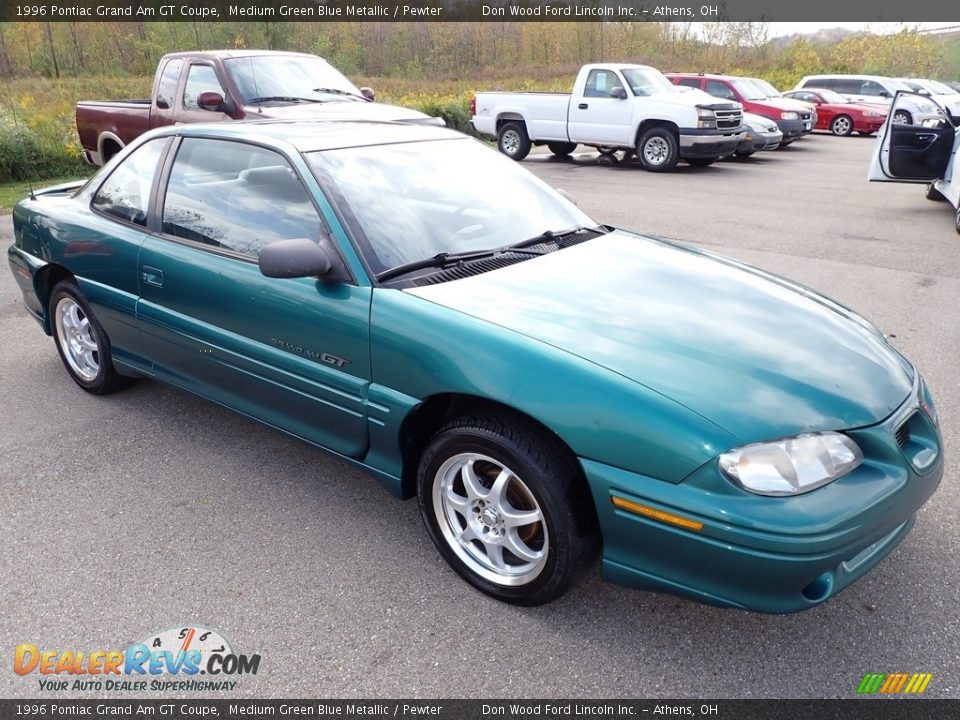 Front 3/4 View of 1996 Pontiac Grand Am GT Coupe Photo #2