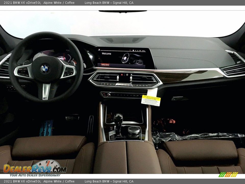 Dashboard of 2021 BMW X6 xDrive50i Photo #5