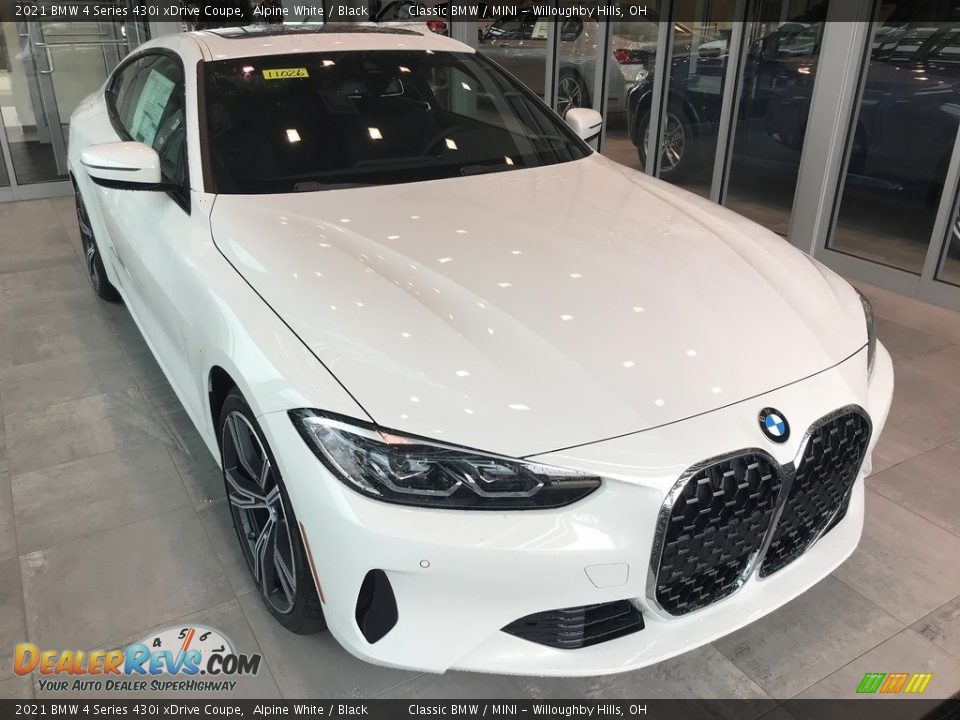 Front 3/4 View of 2021 BMW 4 Series 430i xDrive Coupe Photo #1