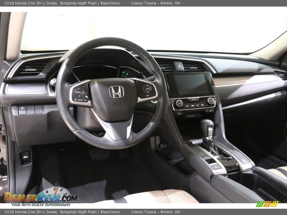 Dashboard of 2018 Honda Civic EX-L Sedan Photo #6
