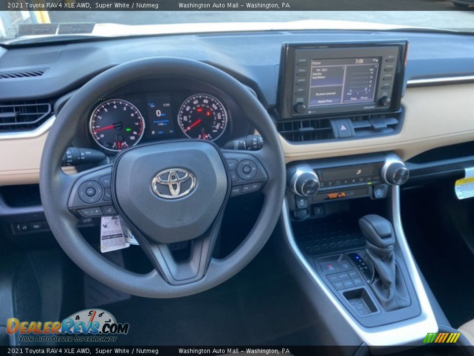 Dashboard of 2021 Toyota RAV4 XLE AWD Photo #11