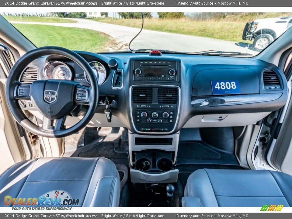 Dashboard of 2014 Dodge Grand Caravan SE w/Wheelchair Access Photo #29